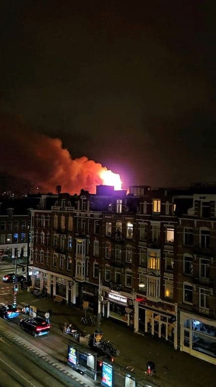 Fireworks accidents kill two in the Netherlands; fire destroys historic Amsterdam church