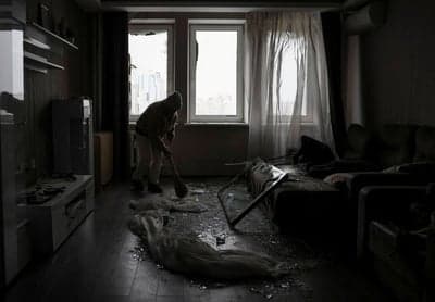 Ukraine toils to restore power and heat, Zelenskiy warns of new attack