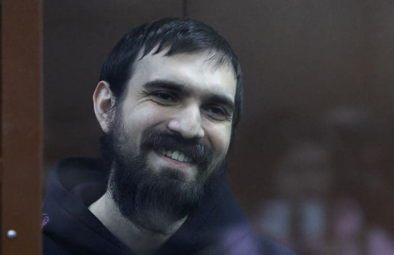 Image for Russian comedian accused of telling offensive joke about Ukraine war veteran is jailed for nearly six years