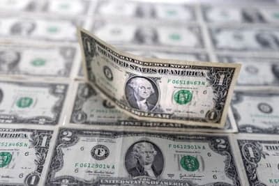 Dollar rebounds with CPI data in line, bankers back Powell