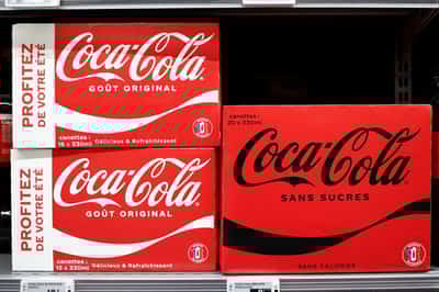 Image for Coca-Cola plans cane-sugar Coke as higher prices boost profits
