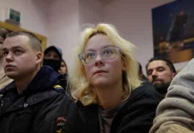 Image for Russian street musician found guilty of 'discrediting' the army after she played anti-Kremlin songs