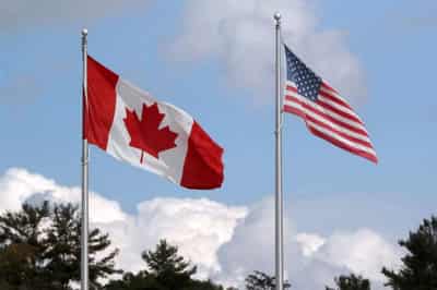 Image for Businesses, U.S. legislators fume as Canada extends travel ban; Trudeau stands firm