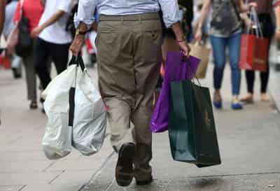 Image for UK shopper numbers dip for third straight week on wet weather