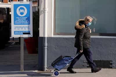 Image for French retailers puzzle over how to keep non-vaccinated shoppers from stores