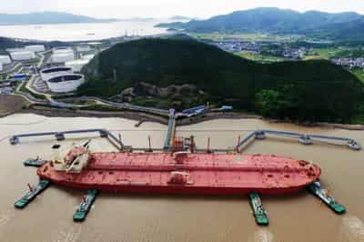 Image for Oil prices climb as demand outlook improves, supplies tighten