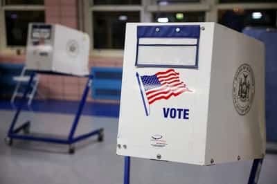 Image for US voters head to polls as turbulent election season nears climax