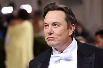 Image for Anticipating US downturn, Elon Musk details Tesla staff cuts