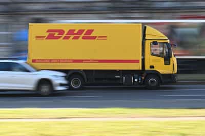 Image for German logistics group DHL posts higher earnings in Q1 but cautious on trade