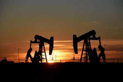 Image for Oil climbs by $4 as further interest rate hikes loom