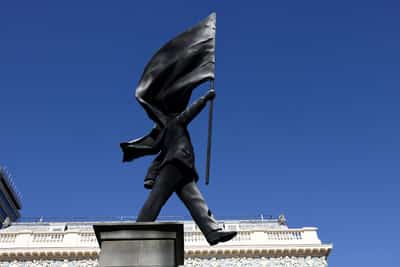 Image for Banksy installs statue of flag-wielding man in central London