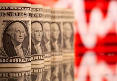 Image for Dollar dips ahead of Powell speech
