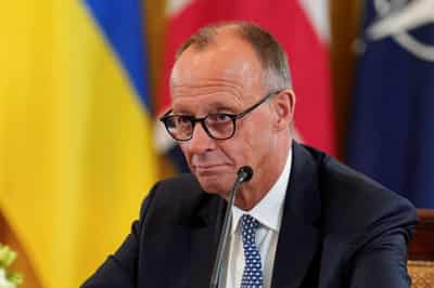 Image for Germany's Merz says Putin, Zelenskiy to meet within next two weeks
