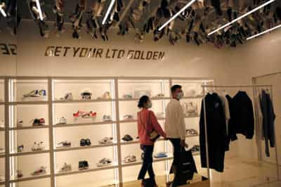 Image for Luxury sneakers may be a step too far for cash-strapped Gen Z
