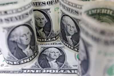 Image for Dollar fades as US inflation slows; China deal in spotlight