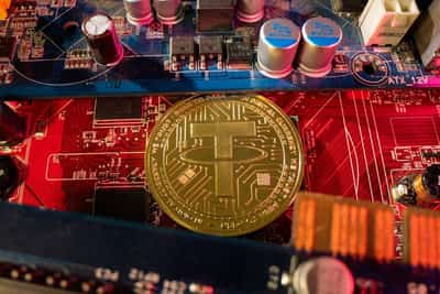 Image for Sanctioned Russian crypto exchange suspends services as Tether blocks wallets