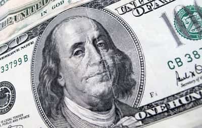 Image for Dollar on back foot as US yields, crude prices dip; Aussie buoyed by hawkish RBA
