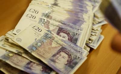 Image for Sterling slips after UK jobs data, politics in focus