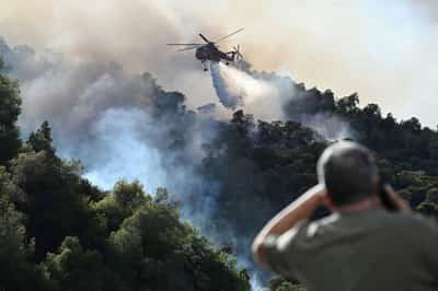 Image for Greece to deploy record number of firefighters this year amid global warming, minister says