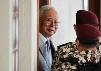 Image for Malaysia court finds ex-PM Najib Razak guilty of abuse of power in biggest 1MDB trial