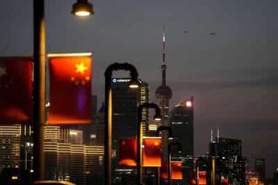 Image for In China’s Wall Street, bankers and traders sleep in offices to beat Shanghai COVID lockdown
