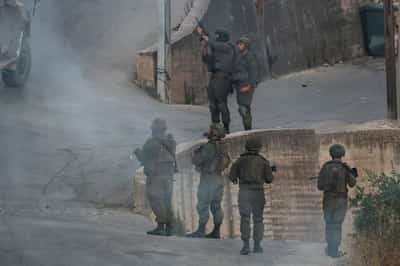 Image for Israeli military cracks down on West Bank village as settlers march in