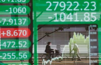Image for Asian shares down on slow-growth fear; dollar stays near three-week low