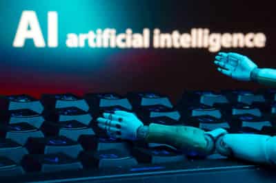 Image for UK firms should take steps to limit risks from frontier AI models, UK says
