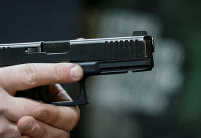 Image for Analysis-Mass shooting reignites push to loosen gun laws in war-torn Ukraine