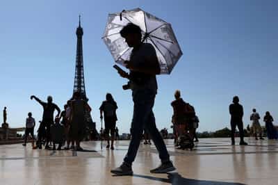 Image for France shuts schools, Italy limits work outdoors in 'exceptional' European heatwave