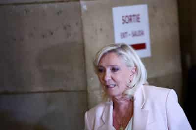 Image for French court shortens Le Pen's ban from office but orders electronic tag