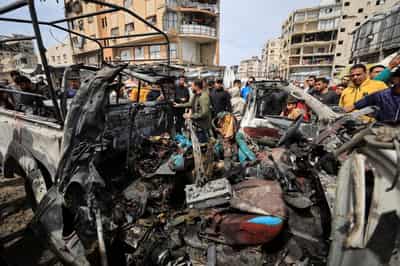 Image for Israeli strike hits police car in Gaza, killing four, medics say