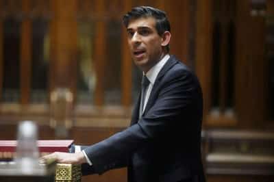 Image for UK’s Sunak, under fire over cost of living, defends his tax cut plans