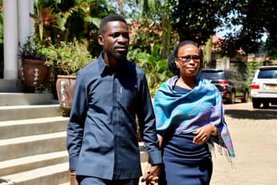 Image for Uganda minister condemns military raid on opposition leader's home