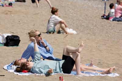Image for Spain plans smoking ban at bar terraces, beaches, stadiums