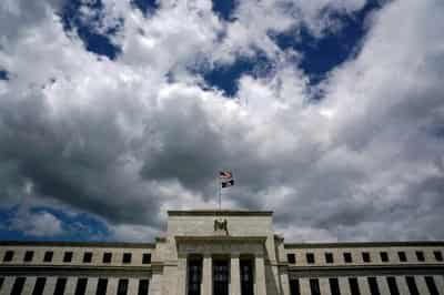 Image for Stocks, dollar dip after data with eyes on Fed