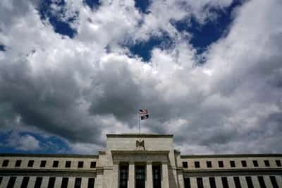 Image for Stocks, dollar dip after data with eyes on Fed