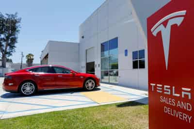 Image for Analysis-Tesla hikes electric car prices in U.S.; holds line in China