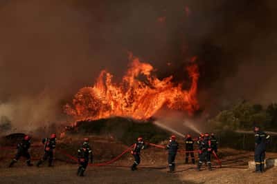Image for Wildfires, heatwaves pose growing fiscal risk to Greece, PM adviser says