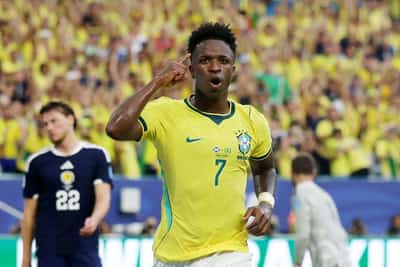 Image for Soccer-Vinicius double helps Brazil past Scotland into World Cup knockouts