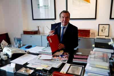 Image for Analysis-Schroeder throws in towel as German industry clings on to Russian gas