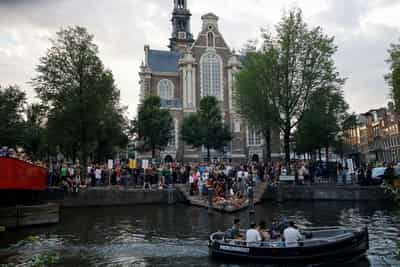 Image for Thousands expected in Amsterdam for boisterous WorldPride in shadow of Berlin attack