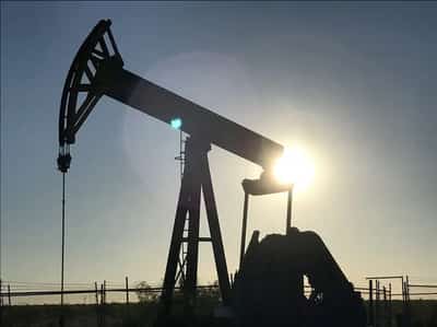 Image for Oil falls as investors weigh ample 2025 supply outlook, delayed OPEC+ output hike