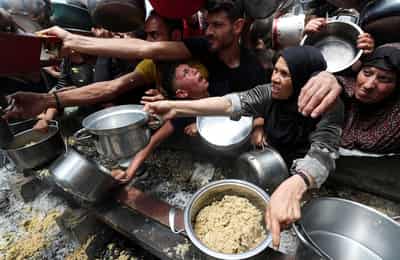 Image for US-backed aid group to start work in Gaza by end of May under heavily criticized plan