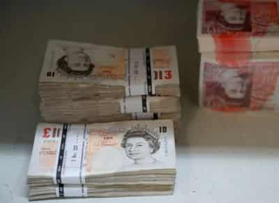 Image for Sterling falls to 6-day low versus euro as EU and UK battle over vaccines