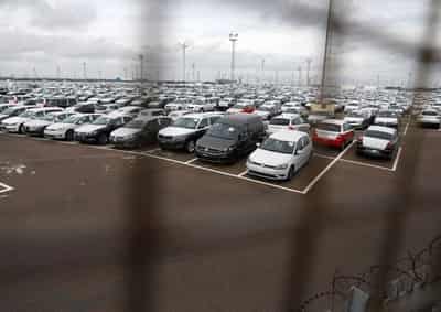 Image for UK auto industry cuts 2022 outlook on supply snags, rising cost of living