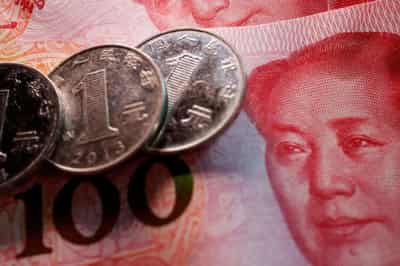 Image for China’s state banks seen selling dollars offshore to slow yuan drop – sources