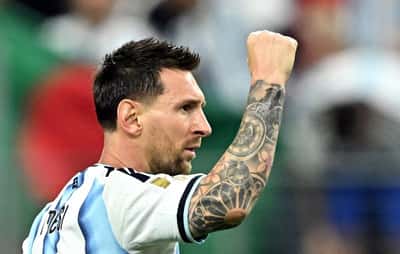 Image for Soccer-Messi breaks World Cup scoring record with a stunning double