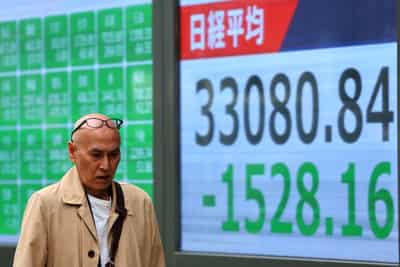 Image for Stocks dip and oil climbs as Trump turns up the heat on Iran