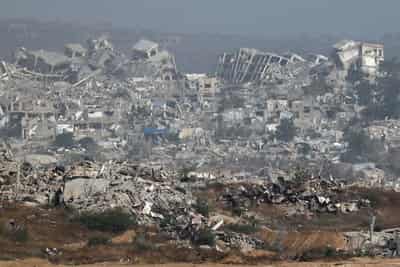 Image for Palestinians rush US-backed aid centre despite concerns over checks